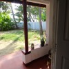 008 Veranda hinten Backwaters Mangobäume.JPG